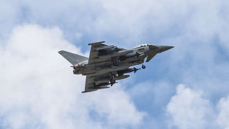 Farnborough, England, UK - July 24, 2010: The BAE Systems Eurofighter Typhoon climbing at the Farnborough International Airshow Event July 24, 2010, Farnborough, United Kingdom.のeditorial素材
