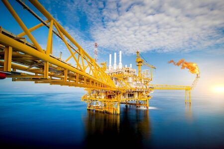 Offshore oil and gas rig platform with beautiful sky in the gulf of Thailand.の写真素材