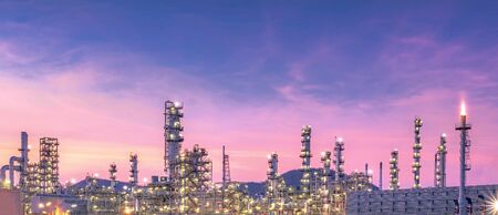 Large oil and gas refinery industrial area and beautiful lighting at Twilight.の写真素材