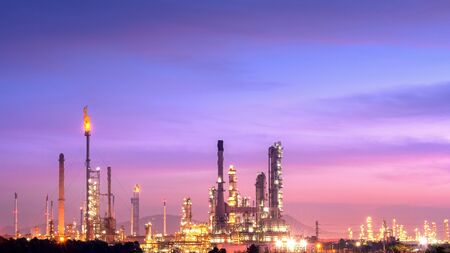 Panorama wide-angle Large oil and gas refinery industrial area at Twilight.の写真素材