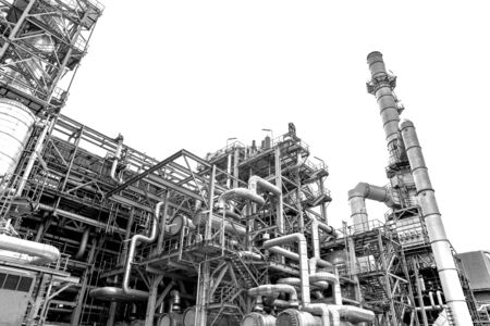 Close-up industrial oil and gas refinery zone,Detail of equipment oil pipeline steel with valves on-off reduce the pressure in the production at refining factory. Silhouettes on white background.の写真素材