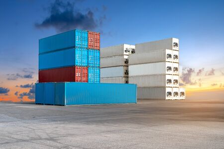 Stack of containers box from Cargo freight ship for import-export at harbor and transportation industrial concept.の写真素材