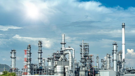 Close up Industrial view at oil refinery plant form industry zone with sunrise and cloudy sky