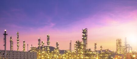 Large oil and gas refinery industrial area and beautiful lighting at Twilight.の写真素材