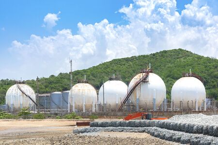 Oil and gas refinery storage tank and Detail of equipment oil pipeline steel with valve for industrail petroleum. の写真素材