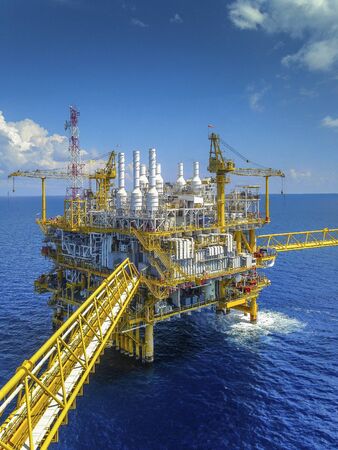 Offshore oil and gas rig platform with beautiful sky in the gulf of Thailand.の写真素材
