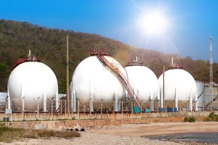 Oil and gas refinery storage tank and Detail of equipment oil pipeline steel with valve for industrail petroleum.の写真素材