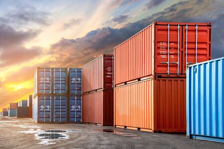 Stack of containers box from Cargo freight ship for import-export at harbor and transportation industrial concept.の写真素材