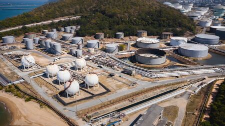Top view oil refinery industry zone, Industrial manufacturing petrochemical,  Refinery plant in the daytime.の写真素材