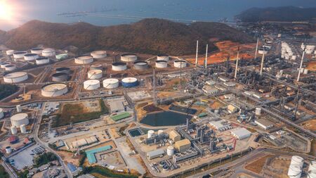 View of Oil and gas industrial refinery zone,Detail of equipment oil pipeline steel and large oil storage tank.の写真素材