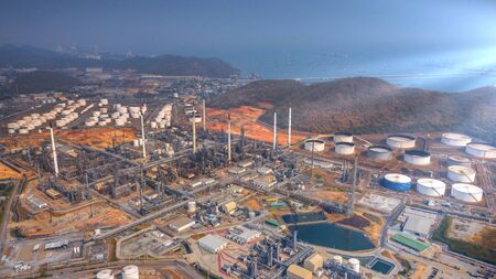 Top view oil refinery industry zone, Industrial manufacturing petrochemical,  Refinery plant in the daytime.の写真素材