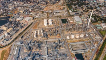 Top view oil refinery industry zone, Industrial manufacturing petrochemical,  Refinery plant in the daytime.の写真素材