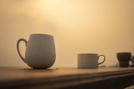 Morning air by the river with your favorite coffee.の写真素材