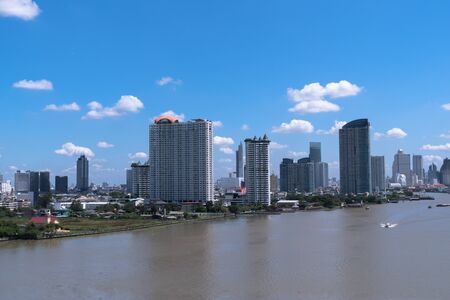 The city view is on the riverside of Bangkok during the day time.の写真素材