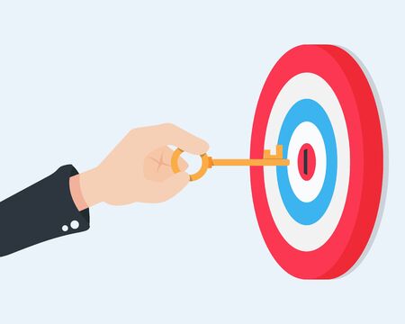 Flat hand are holding the key to unlock the center of the target.If we have a good business plan, it's as if we have the key to success.のイラスト素材