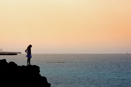 girl looking at ocean
