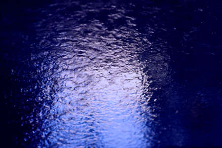 water on glass abstract purple background の写真素材