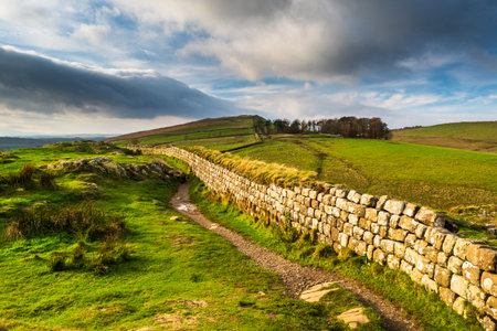 Hadrian's Wall in Northumberland. A two thousand year old UNESCO World Heritage Site with superb views and excellent walking alongside this amazing Roman Wallの写真素材
