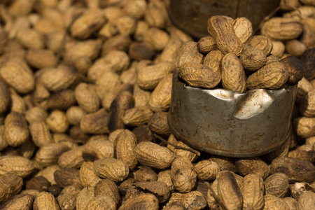 A bowl of peanuts being prepared in Serrekunda Market, Gambia