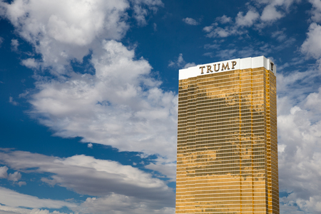 Las Vegas, USA - October 28, 2016:  Trump International Hotel in Las Vegas, NV set against a dramatic blue sky.  Named for US real estate developer and politician Donald Trump, the 64-story luxury property's exterior windows are gilded with 24-carat gold.のeditorial素材