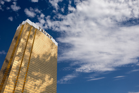 Las Vegas, USA - October 28, 2016:  Trump International Hotel in Las Vegas, NV set against a dramatic blue sky.  Named for US real estate developer and politician Donald Trump, the 64-story luxury property's exterior windows are gilded with 24-carat gold.のeditorial素材