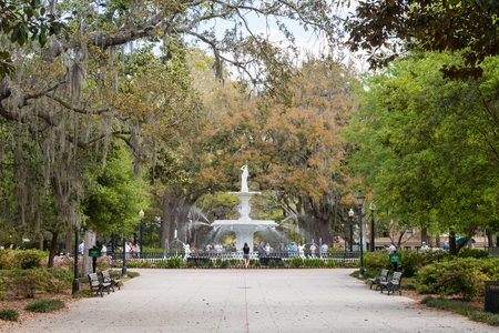 Savannah, GA - March 27, 2017:  Forsyth Park is the largest park in Savannah's historic district and a famous tourist destination.  The fountain dates to 1858 and is symbolic of Savannah.のeditorial素材