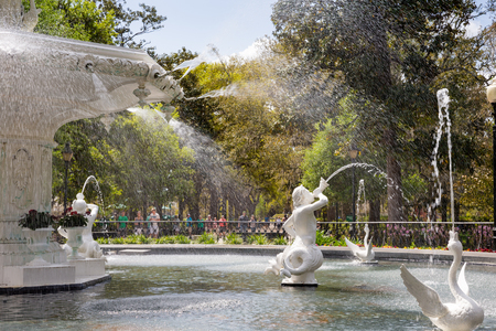 Savannah, GA - March 27, 2017:  Forsyth Park Fountain dates to 1858 and is symbolic of Savannah.  It is a popular tourist destination within the city's historic district.のeditorial素材