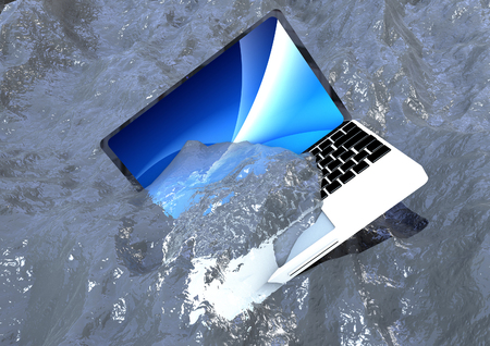 Laptop in waterの写真素材