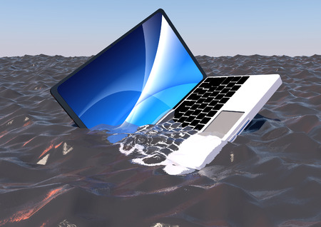 Laptop in waterの写真素材