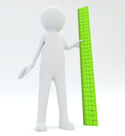 Man with ruler showing growthの写真素材
