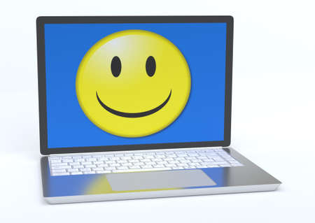 Laptop with smiling faceの写真素材