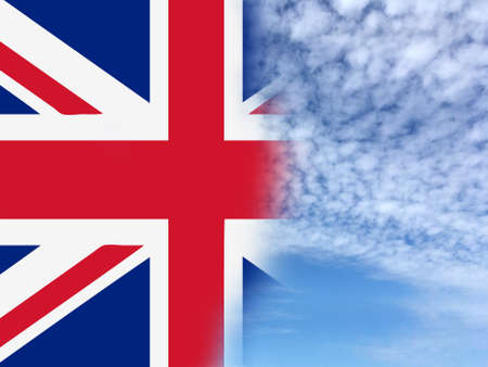 UK flag on blue skyの写真素材