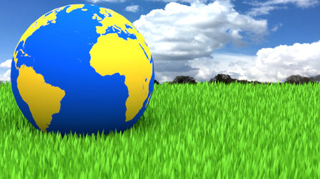 Earth sitting on green grassの写真素材