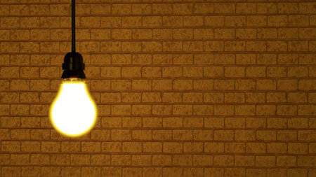 Light bulb on brick wall background. Idea conceptの写真素材