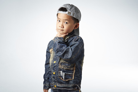 little boy smart poseの写真素材
