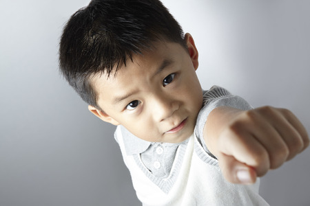 little boy kungfu poseの写真素材