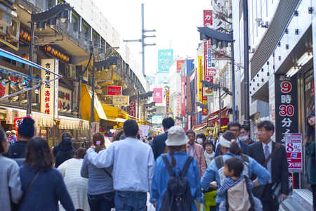 Tokyo, Japan - March 31, 2015: Ameyoko is a busy market street along the Yamanote near Ueno Stations.various products such as clothes, fresh fish, dried food and spices are sold along hereのeditorial素材