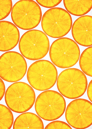 Many rings Orange on white background , back lit .