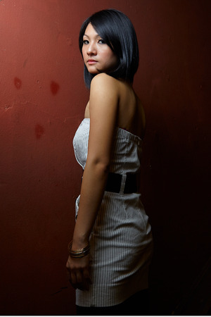A shot of a beautiful asian woman indoorの写真素材