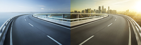 Highway overpass motion blur with city background .の写真素材
