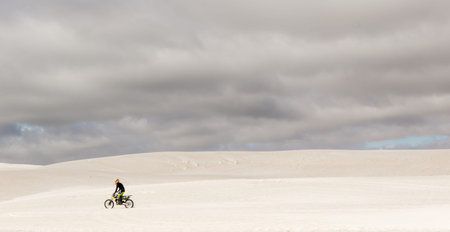 Dune bike rider  at the Lancelin sand dunes near Perth in Western Australiaの写真素材
