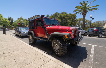 PERTH, AUSTRALIA - November 5, 2016 : Red Jeep  parking in Fremantle city street .のeditorial素材