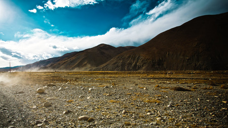 Beautiful scenery in Tibet with great mountain against blue and white clouds sky .の写真素材