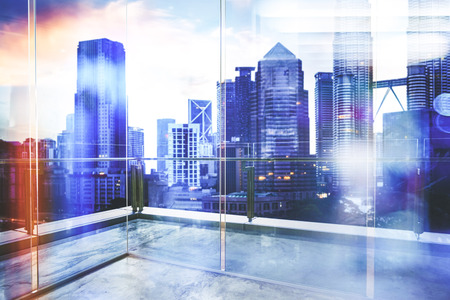 View of urban cityscape from empty business office with glass partition .の写真素材