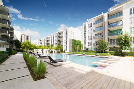 Modern residential buildings with outdoor facilities, Facade of new low-energy houses .