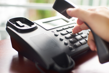 Telephone dialing ,contact and customer service concept . Selected focus .の写真素材
