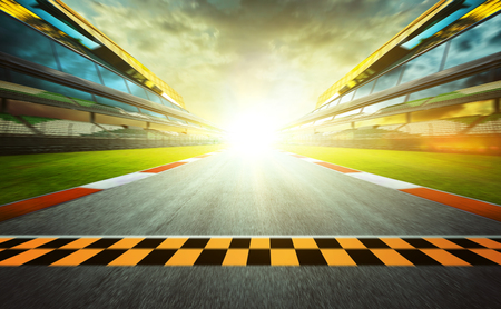 View of the infinity empty asphalt international race track starting or end line, Motion blurred effect.の写真素材