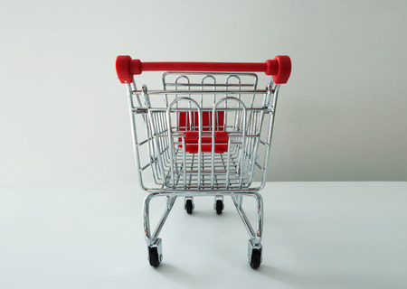 Shopping cart or trolley  on white backgroundの写真素材