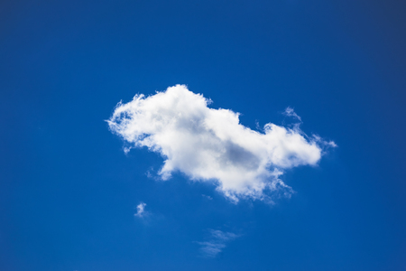 Closeup white fluffy clouds on blue sky .の写真素材