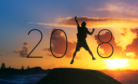 Silhouette businessman happy for 2018 new year .の写真素材